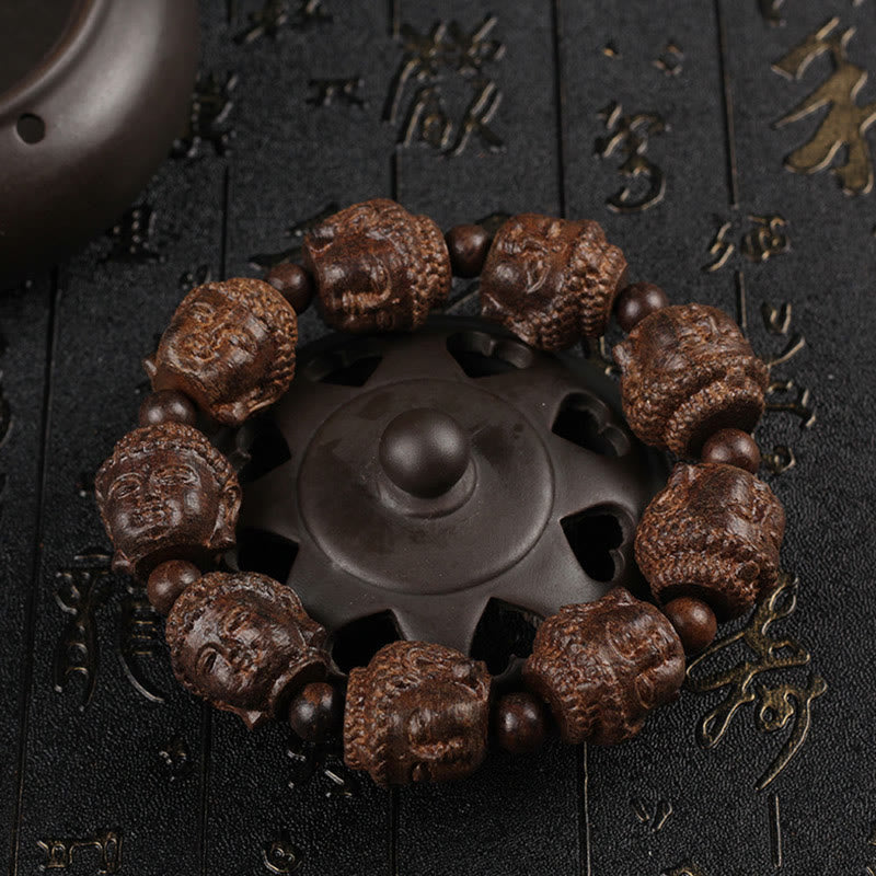 KarmaRipple's Agarwood Buddha Carved Calm Bracelet p1