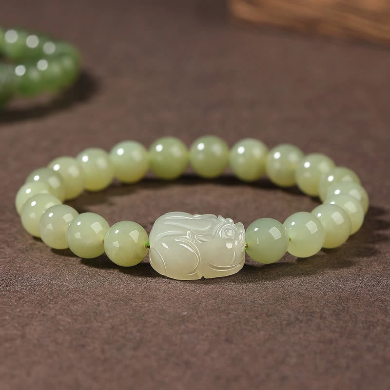 KarmaRipple's Authentic Hetian Jade PiXiu Carved Fortune Bracelet p1