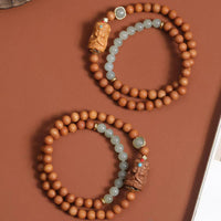 KarmaRipple's Tibetan Zakiram Goddess Of Wealth Hetian Jade Sandalwood Prosperity Bracelet