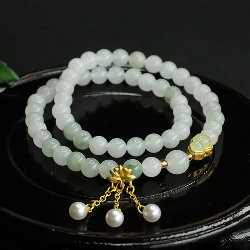 KarmaRipple's Authentic Tianshan Jade Lotus Gourd Double Circle Prosperity Bracelet p1