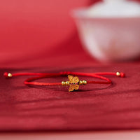 KarmaRipple's 999 Sterling Silver Butterfly Red String Strength Bracelet