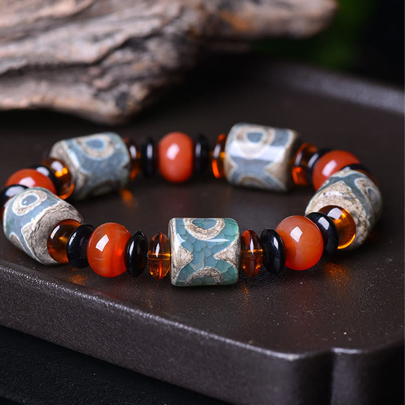 KarmaRipple's Tibetan Three-eyed Dzi Bead Agate Protection Happiness Bracelet p1