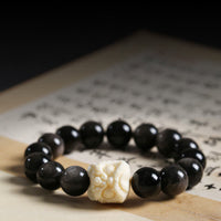 KarmaRipple's Silver Sheen Obsidian Bodhi Seed Ivory Fruit Dancing Lion Protection Bracelet