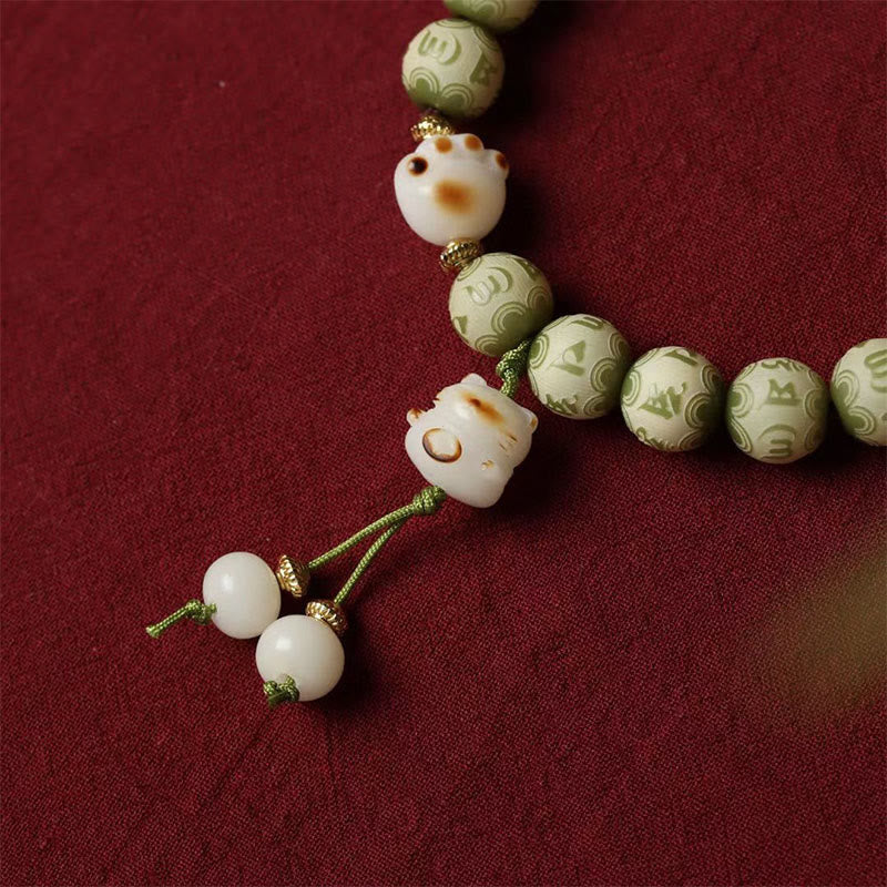KarmaRipple's Green Bodhi Seed Cat Paw Om Mani Padme Hum Engraved Wisdom Bracelet p5